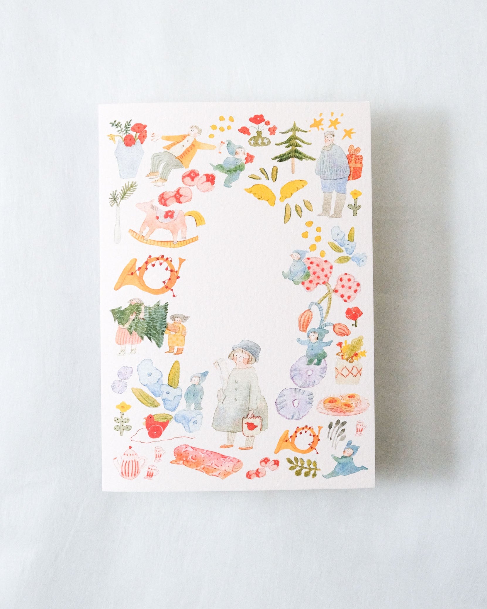 Packaging with a colorful illustrated design on a white background