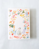 Packaging with a colorful illustrated design on a white background